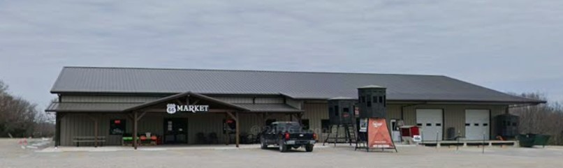 Route 66 Market building with the sign over the covered entrance